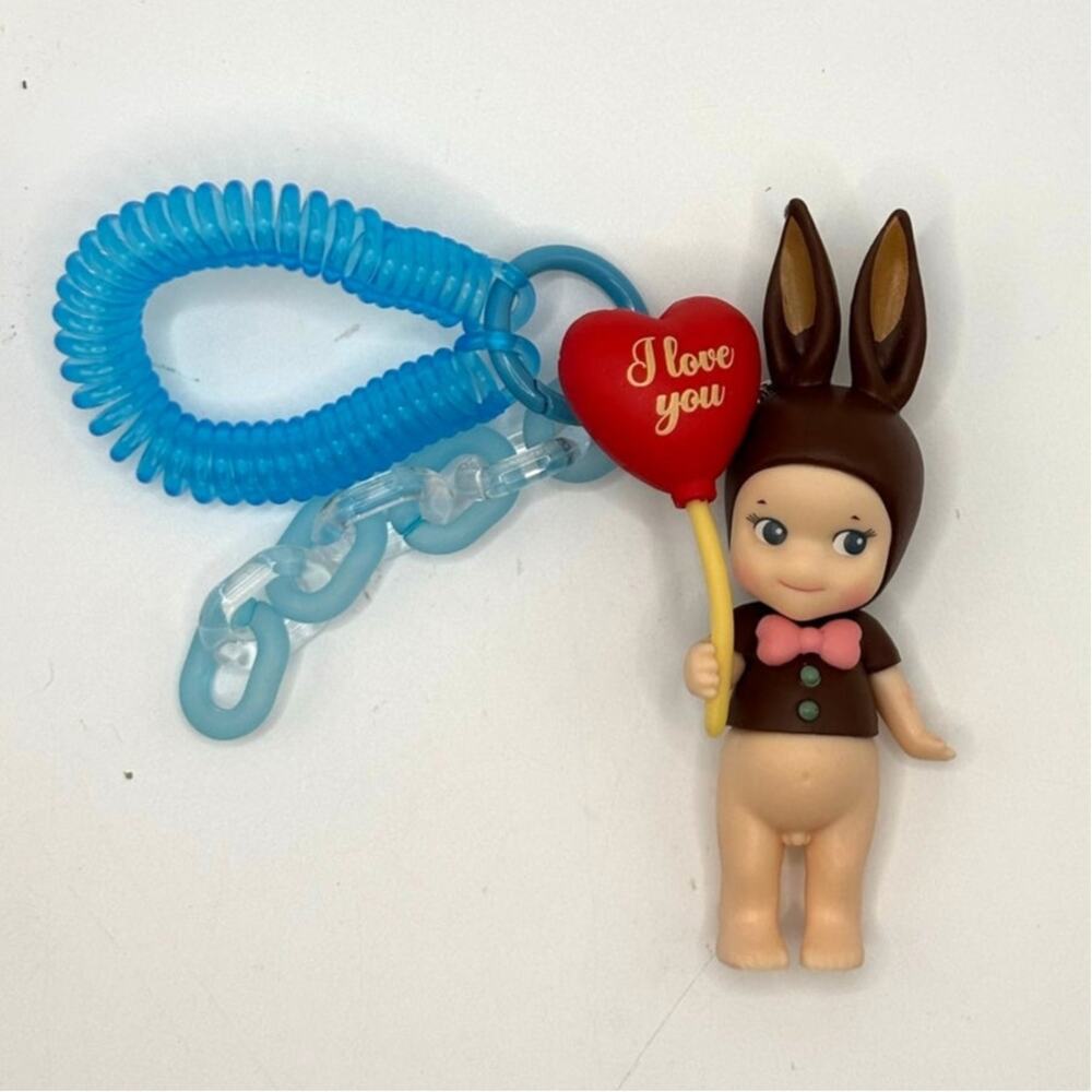 New Unbranded Kewpie/Angel Mini Figure, Chocolate Rabbit w/Balloon Keychain